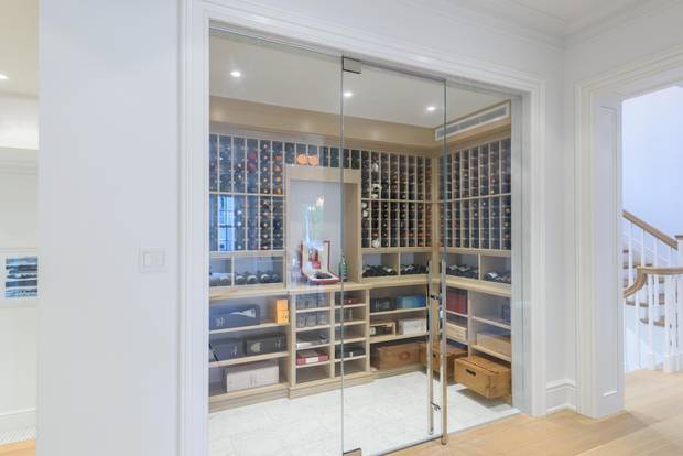 The climate-controlled wine storage can fit more than 700 bottles.