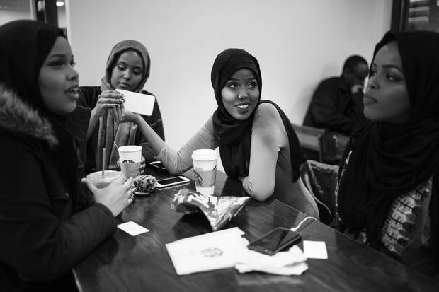Leyla Qurey, Deeqo Qurey, Fadumo Hussein and Susu Hussein gather at a local Starbucks.