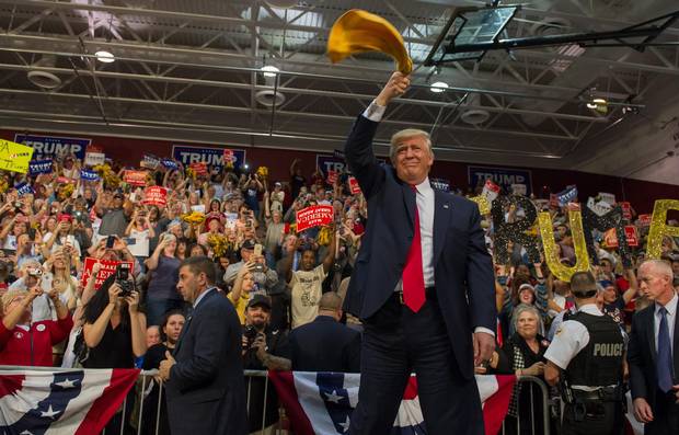 Donald Trump waves a Terrible Towel to supporters at a rally on Oct. 10 in Ambridge, Pennsylvania. Ambridge is named after the American Bridge Company, a steel fabricating plant that employed 60,000 workers. The former industrial community is a traditionally Democratic stronghold that is shifting Republican.