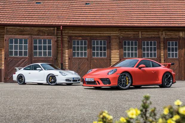 A 2002 GT3 (left), sourced from the Porsche Museum, offers an interesting comparison with the latest edition.