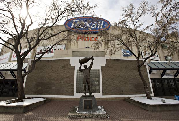 A statue of Wayne Gretzky stands outside Rexall Place in Edmonton. Home of the Oilers, it's in its last season before the team moves to a new rink.