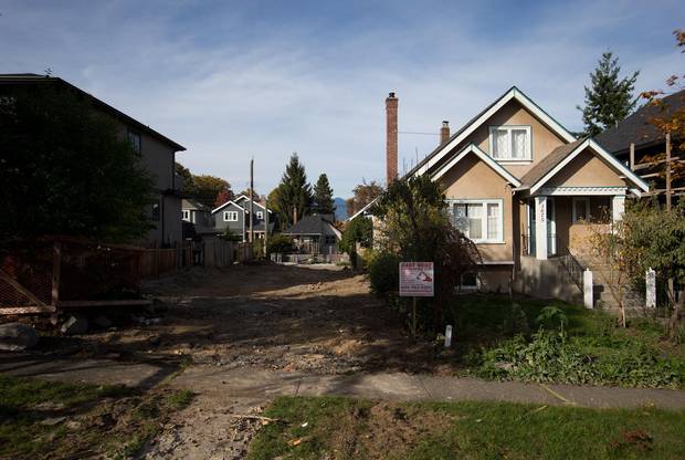 A vacant lot, where a house could be demolished so a new one could be built, is shown in MacKenzie Heights.