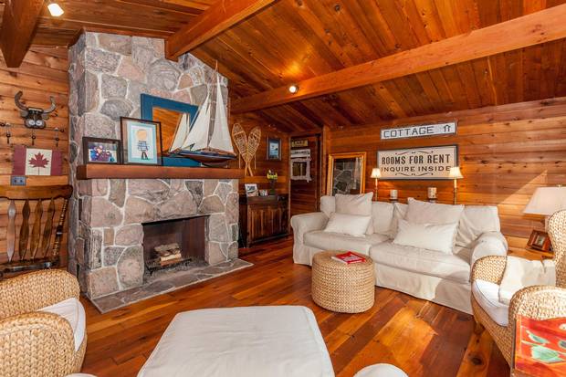 The one-storey cottage includes a field stone fireplace.