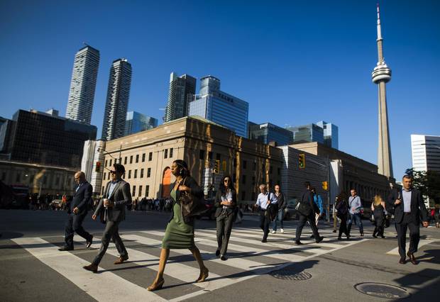 Bay Street in the financial district in Toronto. Canada's approach to immigration puts a premium on work-ready skills.
