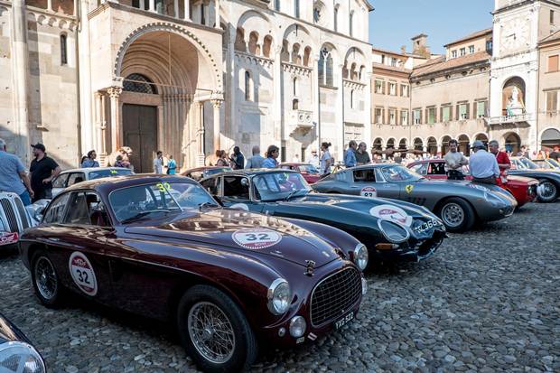 Modena's Piazza Grande serves as the finish line for the annual multi-stage Cento Ore classic car rally. 