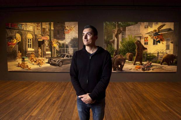 Cree artist Kent Monkman poses for a photograph at his exhibition Shame and Prejudice: A Story of Resilience in Toronto on Jan. 18, 2017.
