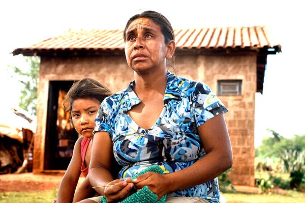 Mara Souza, shown with her daughter Lara in the Dourados Guarani-Kaiowa reservation in Brazil, is the ex-wife of Onildo de Oliveira, who died by suicide.