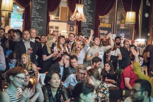 Remain supporters celebrate a result at a referendum party at the Lexington pub in London.