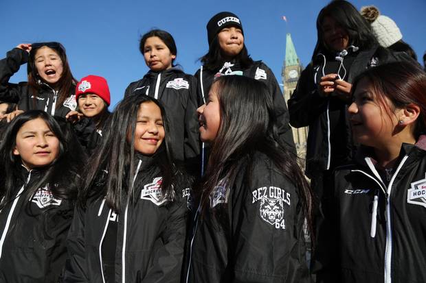 The team poses for a photo on Parliament Hill, March 22, 2018.