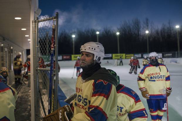 Frost hangs down a player's beard as the game takes a short break for a shift change.