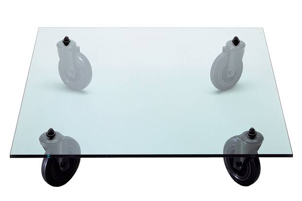 Tavolo Con Ruote low table with glass top by Gae Aulenti for Fontana Arte, $3,177.37 at 1stdibs (1stdibs.com).