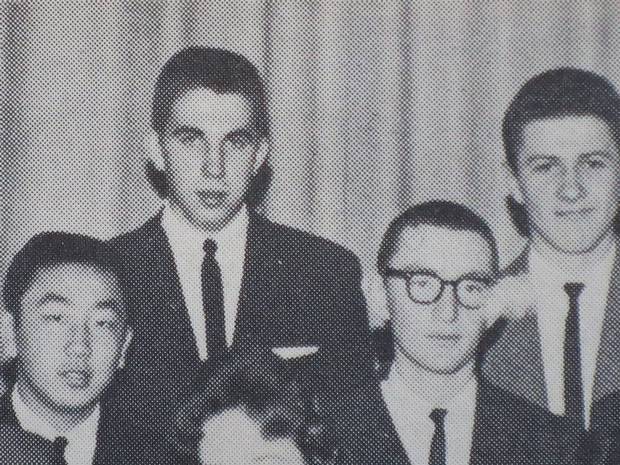 Mr. Brylla is shown second from left in a Grade 11 high-school yearbook photo.