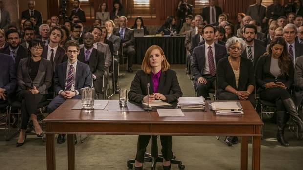 Jessica Chastain, centre, plays Elizabeth Sloane, a tough-as-nails Washington lobbyist who puts her unethical skills to work for an ethical cause.