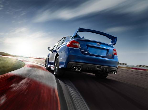 The STI sports an optional rear wing.