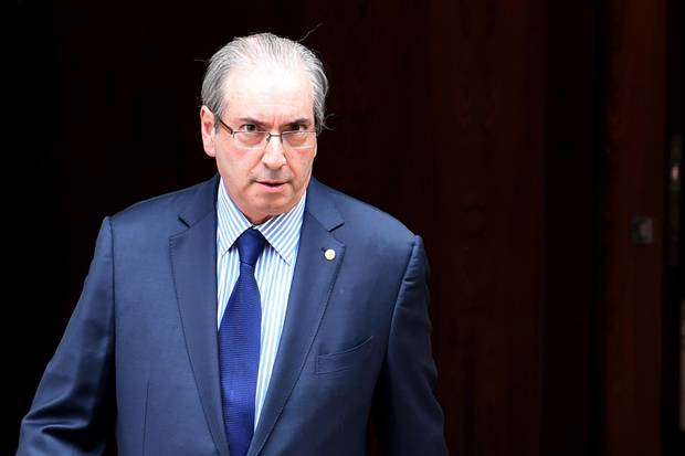 Eduardo Cunha leaves the official residence on his way to the Congress in Brasilia on Dec. 17, 2015.