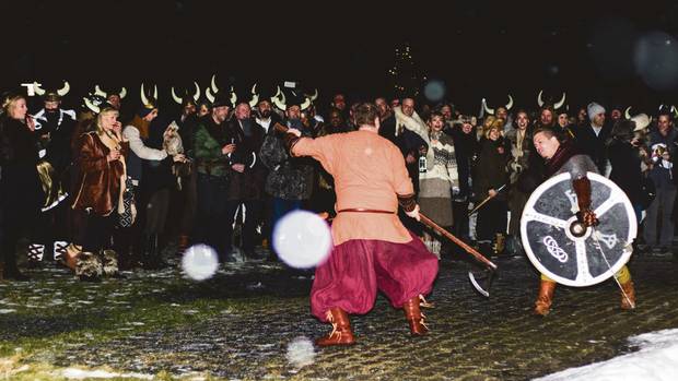 Guests attending the wedding of Canadian fashion director Mosha Lundström Halbert and British-born Aidan Butler at a pre-party viking-themed event in Iceland.