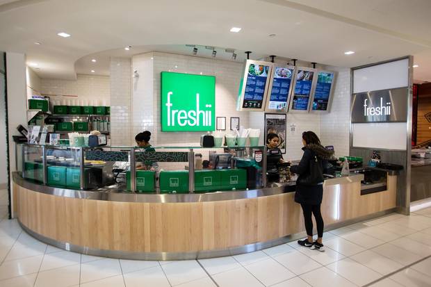 A customer orders food at a Freshii Inc. location in Vancouver on Jan. 12, 2017.