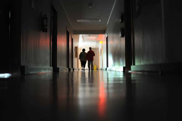 Scott Lister and his sister, Sandra Hamon, walk down the halls of Valley View Centre. The centre for people with intellectual and physical disabilities is closing for good in late 2019, and Scott, who lived there for 62 years, was one of the last residents to leave it.