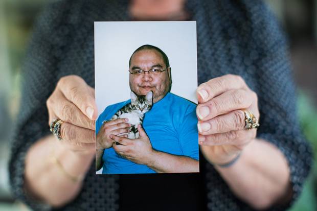 Robyn Batryn of Maple Ridge, B.C., holds up a picture of Phillip Tallio, who has been in prison for 34 years, accused of raping and killing his 22-month-old cousin in 1983. He and his supporters say he’s innocent, and now his case is being appealed.