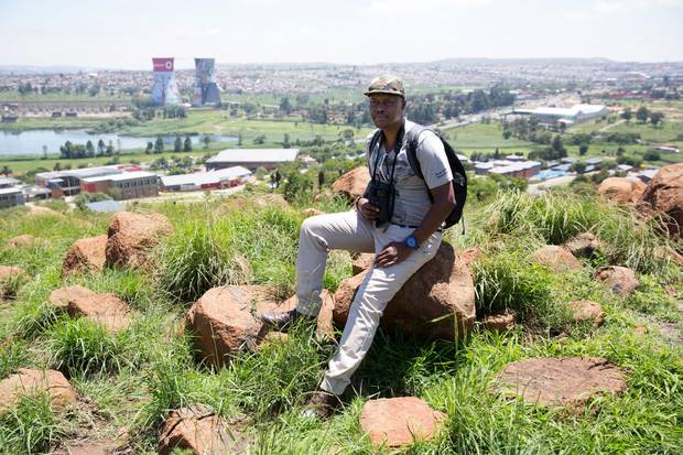 Raymond Rampolokeng, seen on Dec. 15, has been leading bird-watching tours in Soweto, South Africa, since 2007.