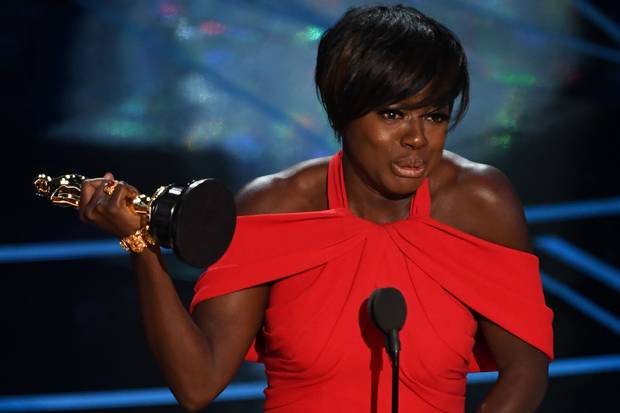 Viola Davis delivers a spech on stage after she won the award for Best Supporting Actress in 
