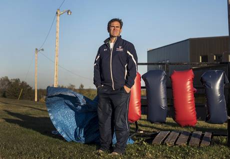 Tantramar Regional High School head football coach Scott O’Neal poses at the school’s practice field in Sackville, N.B., on Thursday. ‘The concussion epidemic is due to players not being properly prepared for competition,’ he says.