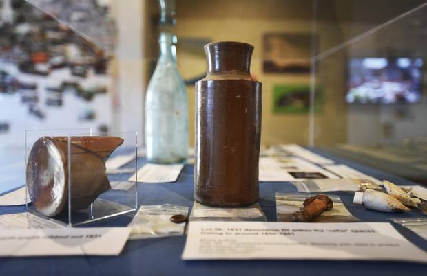 Artifacts from the archeological dig, such as these old bottles, are on display at the Market Gallery until March 18.