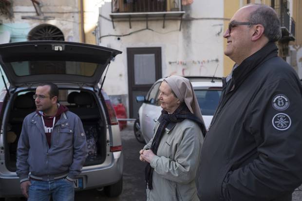 Sister Valeria, middle, and Father Vincenzo (Enzo) Volpe, right, estimate there are 500 Nigerians working against their will on Palermo’s streets and in its brothels.