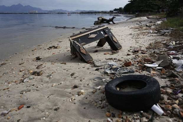 Garbage is seen on Sao Bento beach.
