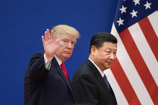 U.S. President Donald Trump and China's President Xi Jinping leave a business leaders event at the Great Hall of the People in Beijing on Nov. 9, 2017.