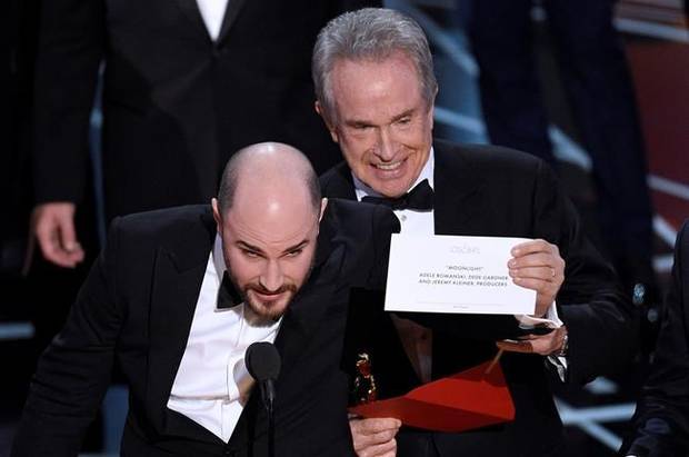 Jordan Horowitz, producer of La La Land, shows the envelope revealing Moonlight as the true winner of best picture at the Oscars on Feb. 26, 2017, at the Dolby Theatre in Los Angeles.