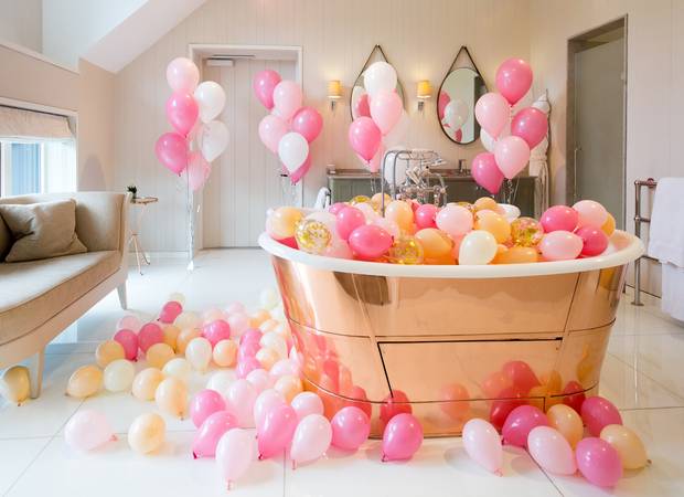 In Britain, Bubblegum Balloons is like the Willy Wonka of inflatable art. Everything is whimsical, unexpected and unabashedly over the top. For a post-wedding suite at the Coworth Park Hotel, in Ascot, the company “completely transformed the bathroom for the happy couple,” according to Bubblegum’s Ellen Reed. Instead of the typical rose petals, pink, pearl and peach balloons overflowed from the tub.