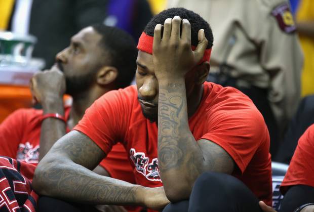 Terrence Ross #31 of the Toronto Raptors reacts on the bench during the second half against the Cleveland Cavaliers.