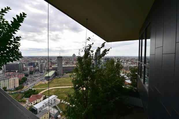 Trees are seen from one of the apartments inside the Bosco Verticale towers in the Residenze Porta Nuova area of Milan.
