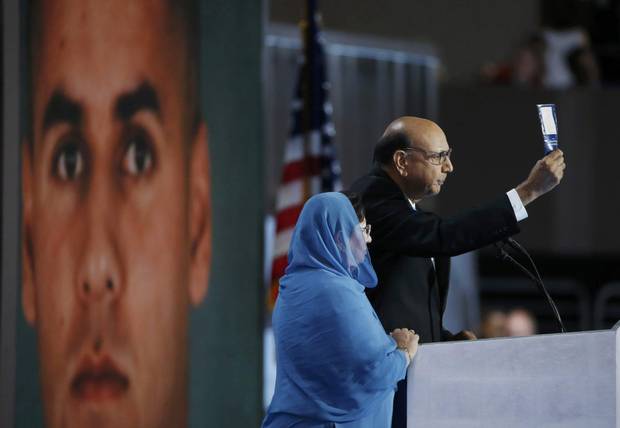 Khizr Khan, whose son was killed serving in the U.S. Army, challenges Republican presidential nominee Donald Trump to read his copy of the U.S. Constitution.