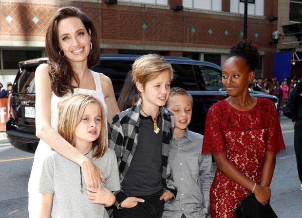 Angelina Jolie arrives on the red carpet with her children, Vivienne Jolie-Pitt, Shiloh Jolie-Pitt, Knox Leon Jolie-Pitt and Zahara Jolie-Pitt, for the film The Breadwinner. Jolie is the film's executive producer.