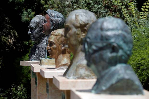 A bust of Mr. Peres, left, is seen next to other former Israeli presidents in the gardens at the Israeli presidential residence in Jerusalem.