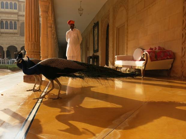 At breakfast, Jaisalmer's Suryagarh hotel releases peacocks in the courtyard to charm guests.