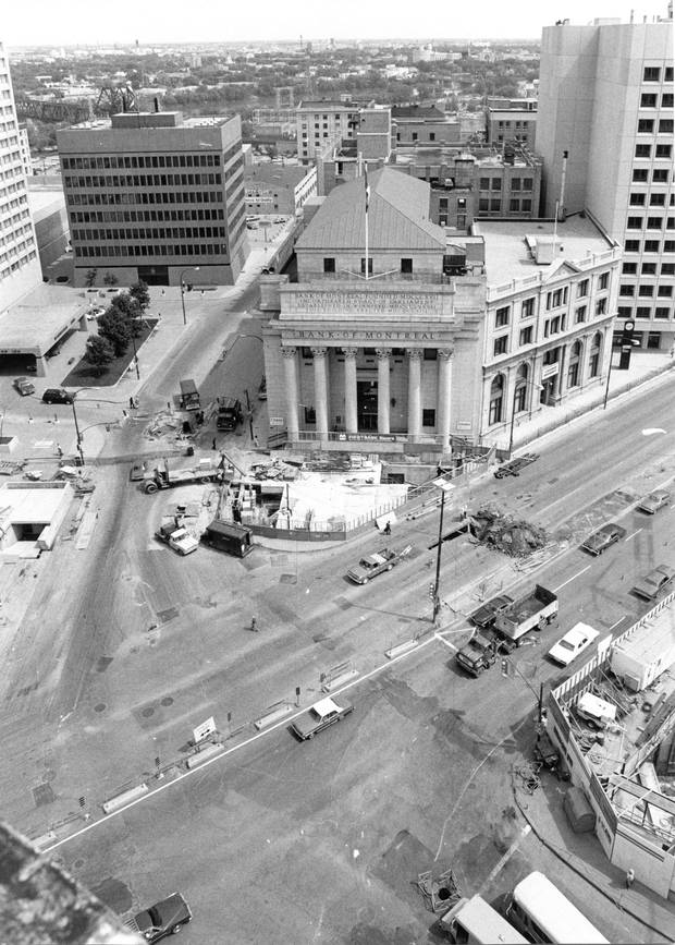 1978: City crews overhaul the pavement at Portage and Main, replacing existing sidewalks with paving stone walks in front of the bank building.