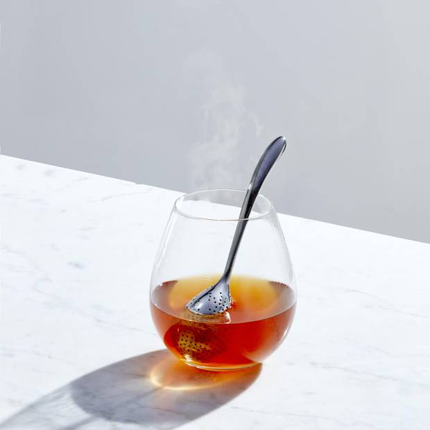 Georg Jensen tea egg, $65, through Studio Brillantine. Glass, stylist’s own. 