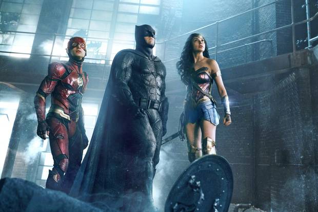 Ezra Miller as the Flash, Ben Affleck as Batman and Gal Gadot as Wonder Woman in Justice League.