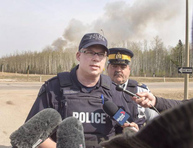 RCMP Inspector Kevin Kunetzki updates the media on the highway to Fort McMurray, Alta., on Saturday, May 7, 2016.
