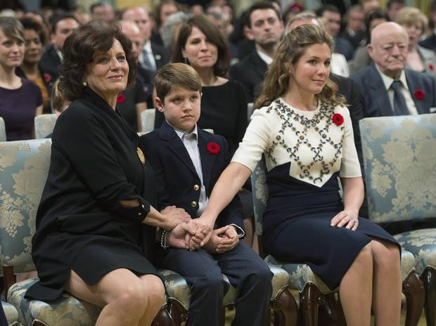 Margaret Trudeau, left, holds hands with her grandson Xavier and his mother Sophie Grégoire Trudeau at the swearing-in ceremony of Justin Trudeau and his cabinet last fall.