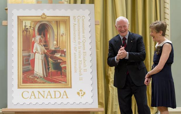Govovernor-General David Johnston and his wife, Sharon, unveil a postage stamp commemorating the 60th anniversary of the Queen’s coronation at Rideau Hall on May 8, 2013.