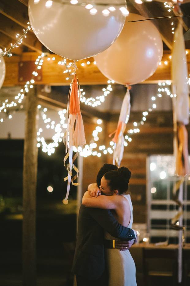 For the end-of-December wedding of Katie Risinger and Ivan Dorflinger, stylist Emily Leach, of Bird Dog Wedding in Austin, Tex., created a “canopy of giant tassel balloons under which everyone danced the night away,” she says. “Blush and punchy citrus hues lent themselves to the festive feel.”