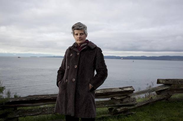 Mayor Lisa Helps is photographed in front of the Strait of Juan de Fuca, where oil tankers pass through regularly if the pipeline expansion is approved.