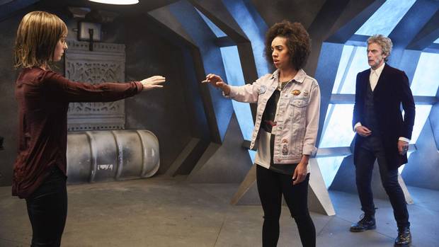 Heather (Stephanie Hyam), Bill (Pearl Mackie) and the Doctor (Peter Capaldi) in a scene from Doctor Who.