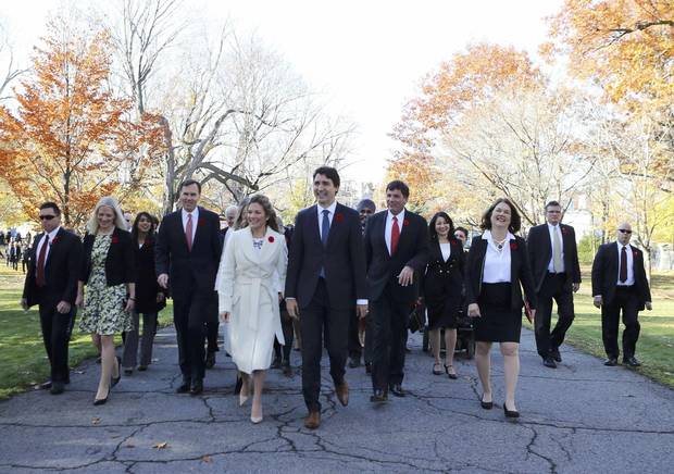 Prime Minister Justin Trudeau and his wife, Sophie Grégoire, arrive with his cabinet before his swearing-in ceremony at Rideau Hall in Ottawa on Nov. 4, 2015.