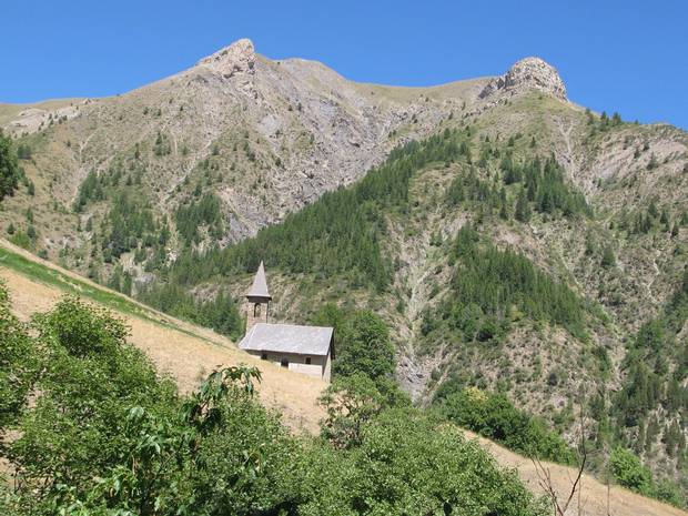 A church nestled in rugged country on the climb of the Col d'Allos, in Les Alpes-de-Haute-Provence, on day 7.