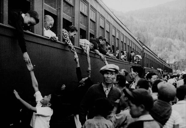 Japanese-Canadians are shown being relocated to camps in the interior of British Columbia in a photo taken between 1942 and 1946.